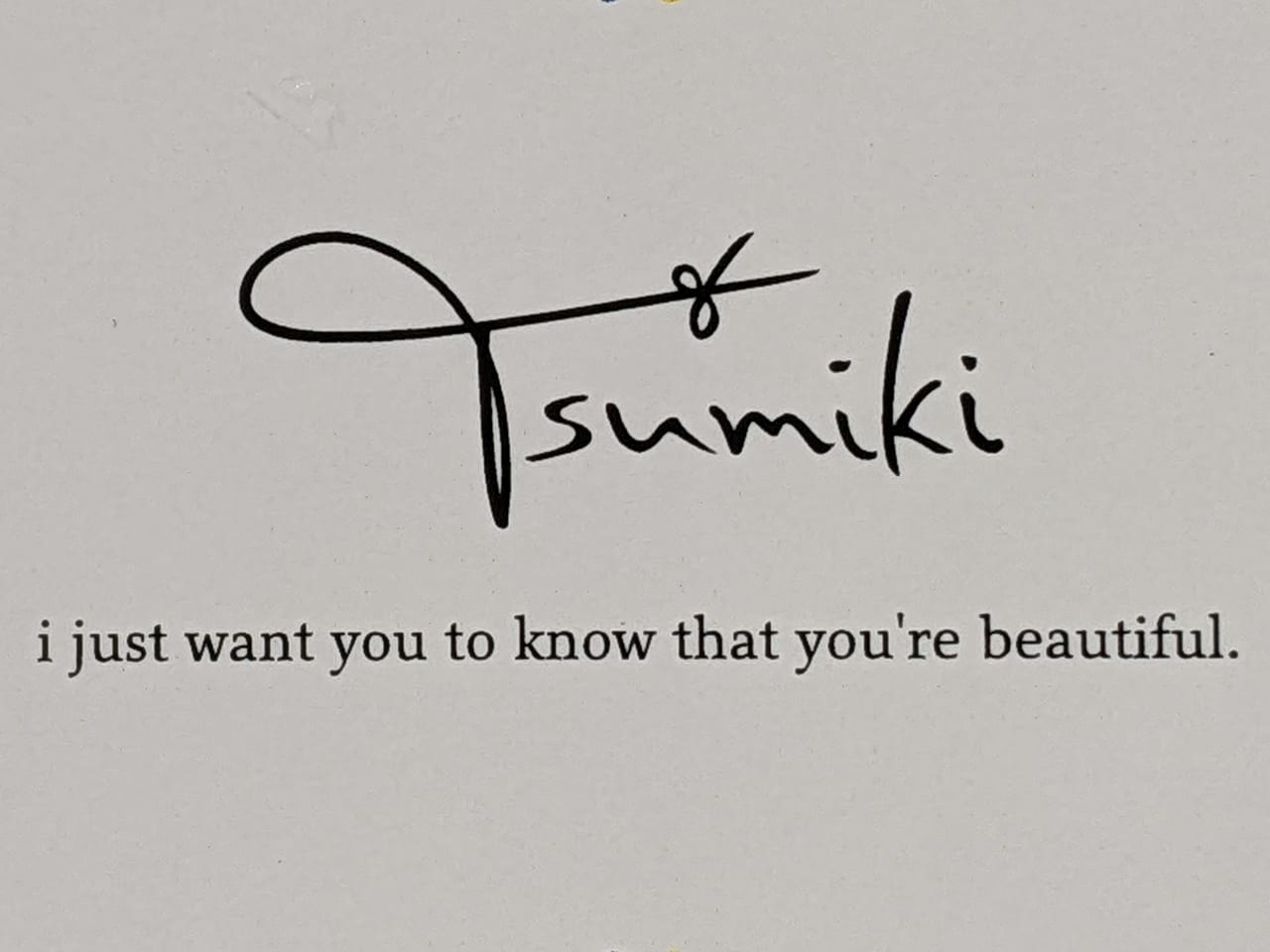 美容室「Tsumiki 本店」のロゴ